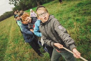 Children playing tug of war.