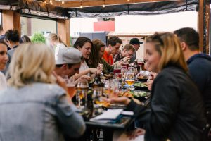 People eating and talking.