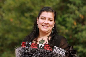 Woman wearing korowai (traditional cloak).